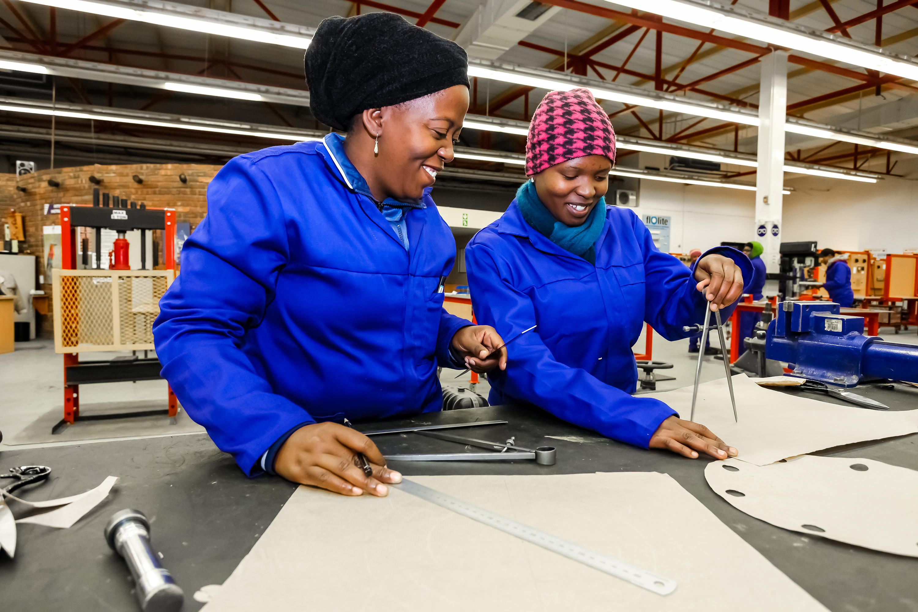 Women working together, focusing on skills